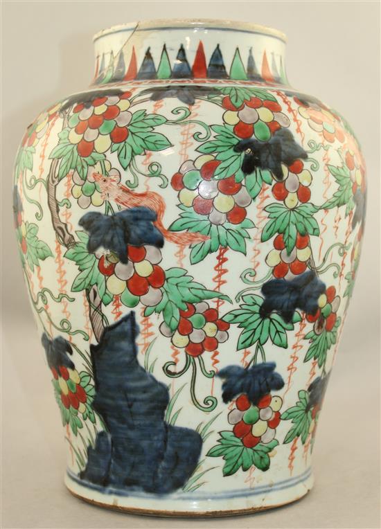 A Chinese wucai baluster jar, 17th century, 32cm., broken and restored